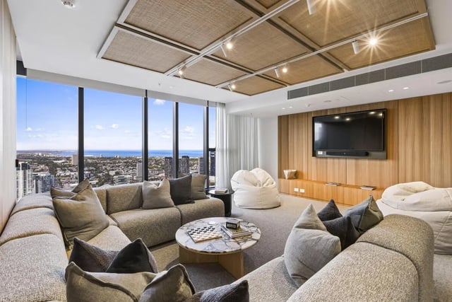 Sectional sofa beanbags marble coffee table living room at West Tower, Melbourne Quarter in Melbourne Student Accommodation