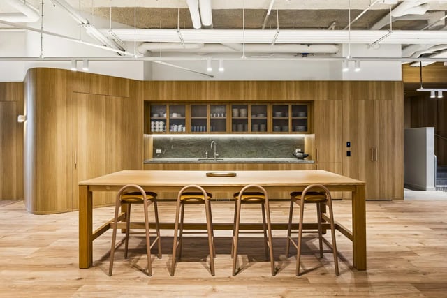 Wooden kitchen island with bar stools kitchen at West Tower, Melbourne Quarter in Melbourne Student Accommodation