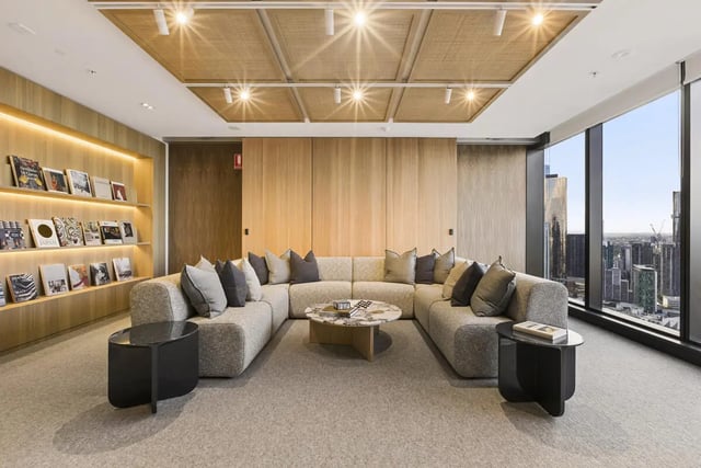 Comfortable U-shaped sofa with coffee table living room at West Tower, Melbourne Quarter in Melbourne Student Accommodation