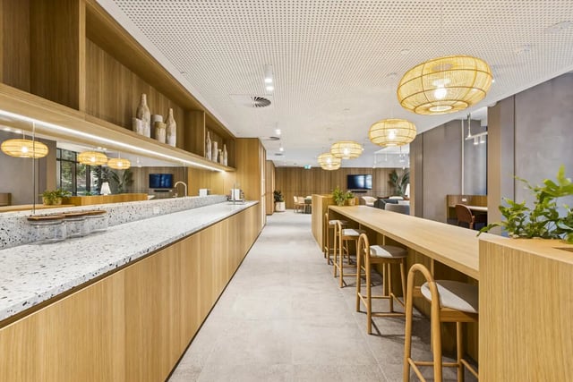 Counter bar with stools and cabinets communal area at West Tower, Melbourne Quarter in Melbourne Student Accommodation