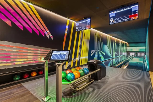 Bowling balls and screens bowling alley at West Tower, Melbourne Quarter in Melbourne Student Accommodation