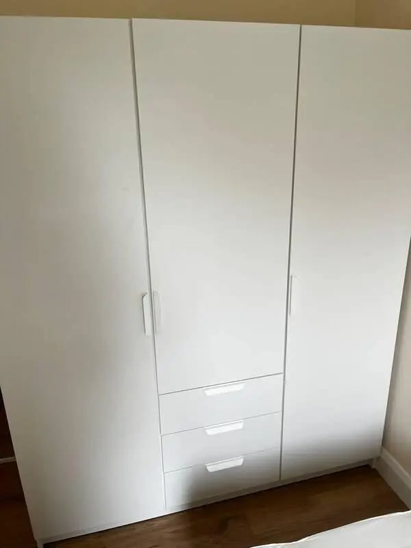 White wardrobe with three drawers bedroom storage at 16 Emmet Lodge, Emmet Court, Dublin 8 D08 EY83 in Dublin Student Accommodation