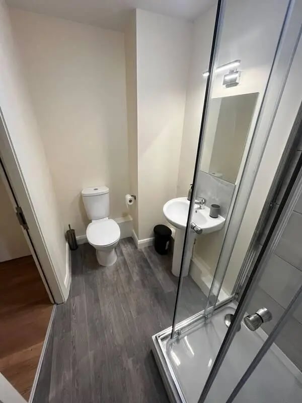 Toilet sink shower with glass doors bathroom at 16 Emmet Lodge, Emmet Court, Dublin 8 D08 EY83 in Dublin Student Accommodation