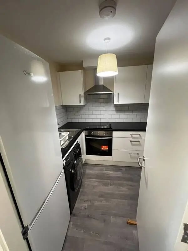 Fridge washing machine oven white cabinets kitchen at 16 Emmet Lodge, Emmet Court, Dublin 8 D08 EY83 in Dublin Student Accommodation