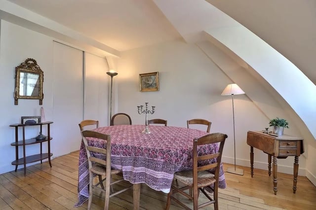 Round table with chairs and decorative objects Dining room at Apartment in Rue César Franck, 75015 Paris, France in Paris Student Accommodation