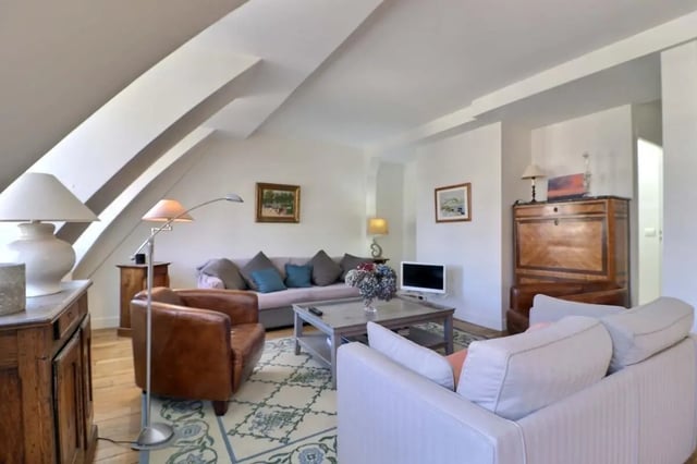 Comfortable living area with sofas and coffee table living room at Apartment in Rue César Franck, 75015 Paris, France in Paris Student Accommodation
