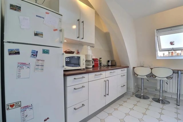 Refrigerator microwave coffee maker toaster kitchen interior at Apartment in Rue César Franck, 75015 Paris, France in Paris Student Accommodation