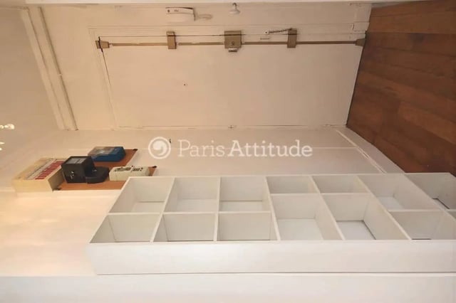 Shelving unit with meters and drawer storage area at Apartment in Cité Voltaire, 75011 Paris, France in Paris Student Accommodation