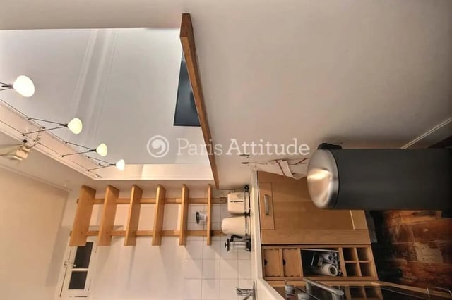 Wooden shelves appliances and cabinets kitchen at Apartment in Cité Voltaire, 75011 Paris, France in Paris Student Accommodation