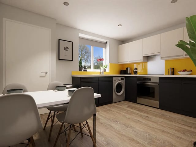 Dining table four chairs washing machine kitchen kitchen at City Edge - Manchester in Manchester Student Accommodation