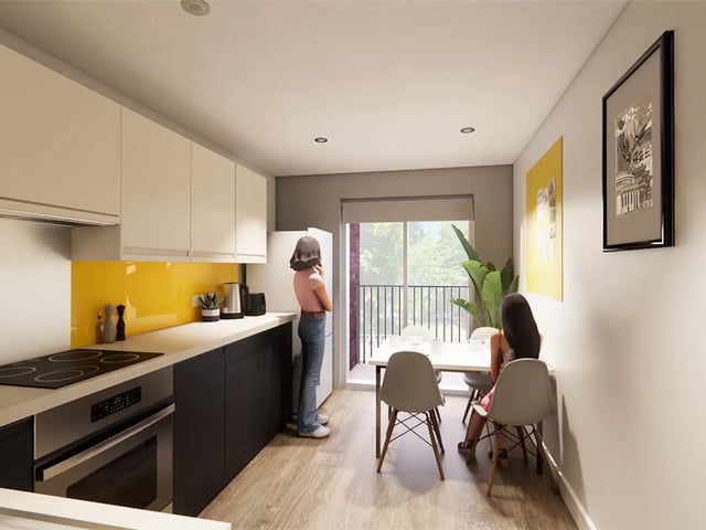 Modern kitchen with dining table and two people kitchen at Moss Court in Manchester Student Accommodation