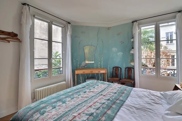 Bed with desk mirror two chairs bedroom at Apartment in Rue Clauzel, 75009 Paris, France in Paris Student Accommodation