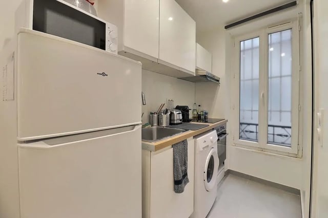 Refrigerator microwave sink washing machine kitchen at Studio in Av. Félix Faure, 75015 Paris, France in Paris Student Accommodation
