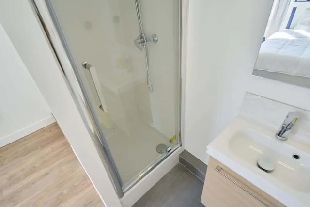 Glass shower cabin and sink in bathroom at Room in 121 Rue Haxo, 75019 Paris, France in Paris Student Accommodation
