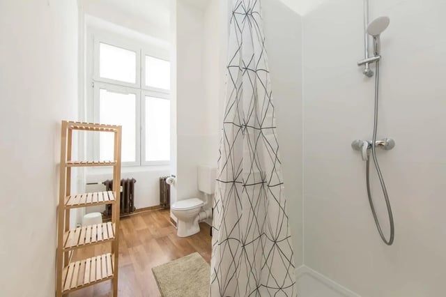 Toilet shower shelf and window bathroom at Hohenzollerndamm 53.6 in Berlin Student Accommodation