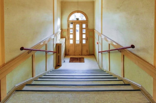 Staircase with door at top and railings hallway at Hohenzollerndamm 53.6 in Berlin Student Accommodation