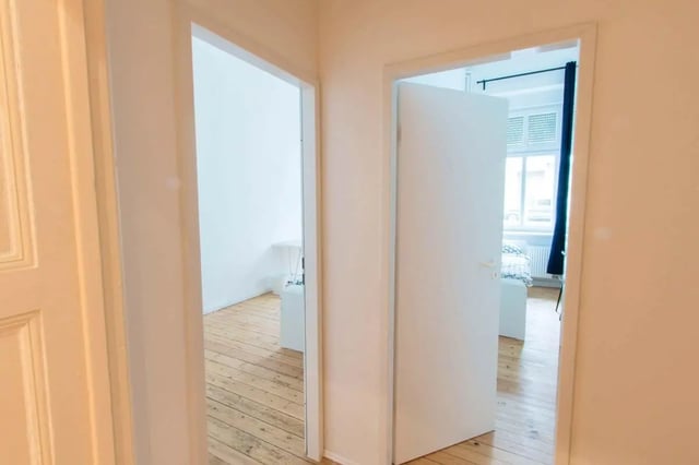 Open doors reveal bedroom study area bedroom at Room in Detmolder Str., 10713 Berlin, Germany in Berlin Student Accommodation