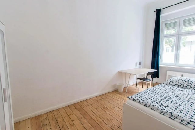 Bed desk trash can window bedroom at Room in Detmolder Str., 10713 Berlin, Germany in Berlin Student Accommodation