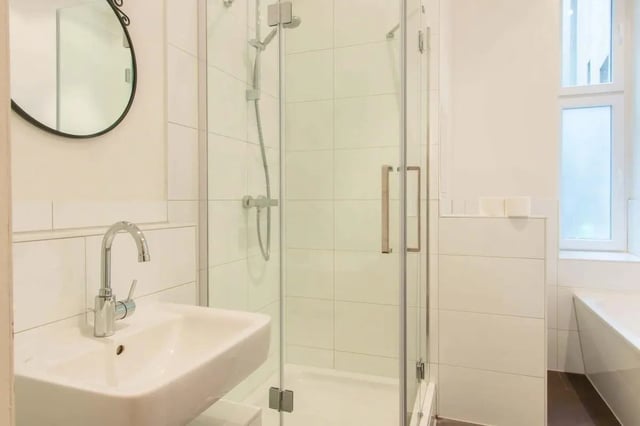Sink shower mirror and bathtub bathroom at Room in Detmolder Str., 10713 Berlin, Germany in Berlin Student Accommodation