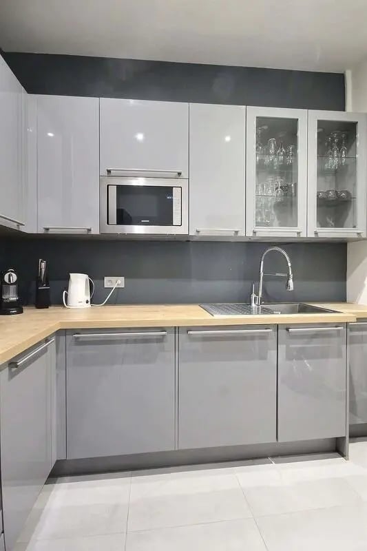 Modern grey kitchen with microwave and sink kitchen at Apartment 1 bedroom 41m² in Paris Student Accommodation