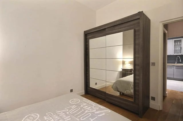 Wardrobe with mirrored doors and bed Bedroom at Apartment 1 bedroom 41m² in Paris Student Accommodation