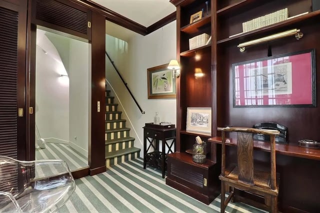 Staircase, bookshelves, desk, chair, clear chair Study area at Apartment in Rue Saint-Honoré, 75001 Paris, France in Paris Student Accommodation