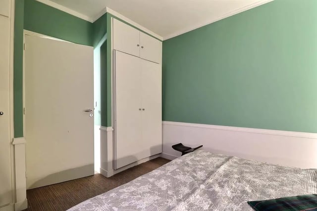 Closet bed and stool bedroom at Apartment in Rue Saint-Honoré, 75001 Paris, France in Paris Student Accommodation
