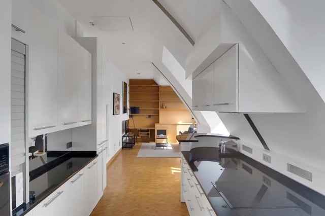 White cabinets black counters herringbone floor living kitchen at Rue de Bretagne in Paris Student Accommodation