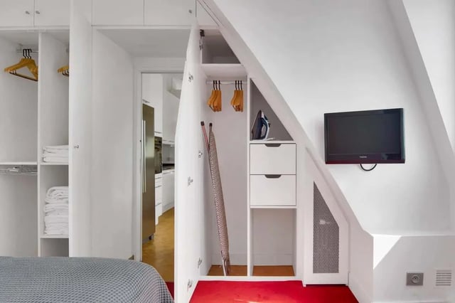 Closet with iron ironing board and TV Bedroom at Rue de Bretagne in Paris Student Accommodation