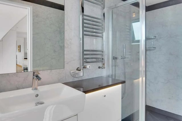 Sink towel rack shower and mirror bathroom at Rue de Bretagne in Paris Student Accommodation
