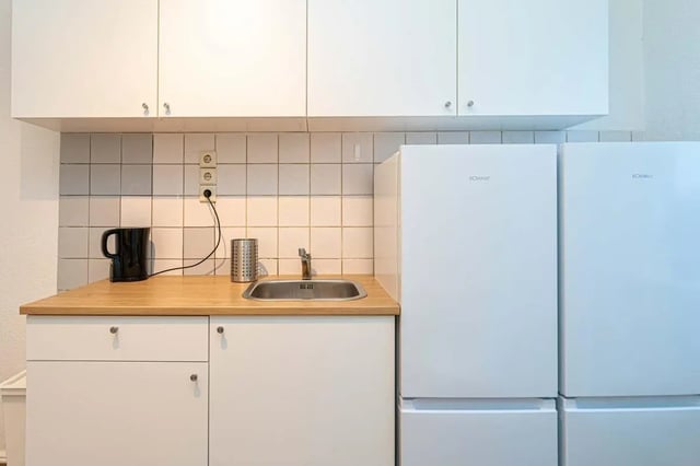 Sink kettle fridges and cabinets kitchen at Sterndamm 75.2 75.3 in Berlin Student Accommodation