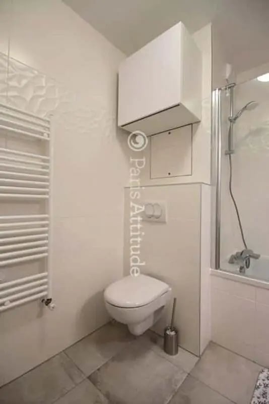 Toilet shower towel rack and cabinet bathroom at Apartment in Rue de Clichy, 75009 Paris, France in Paris Student Accommodation