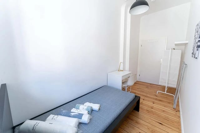 Bed desk chair and storage unit bedroom at Wühlischstraße - Room 3 in Berlin Student Accommodation