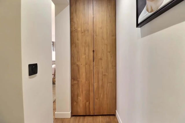 Wooden double door closet hallway interior at Apartment Studio 38m² in Paris Student Accommodation