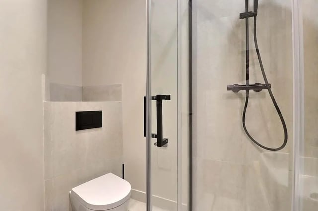 Toilet shower enclosure with black fixtures bathroom at Apartment Studio 38m² in Paris Student Accommodation