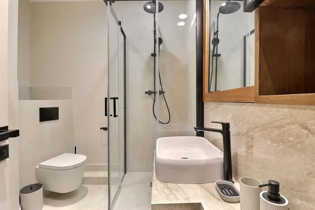 Toilet shower sink with modern fixtures bathroom at Apartment Studio 38m² in Paris Student Accommodation