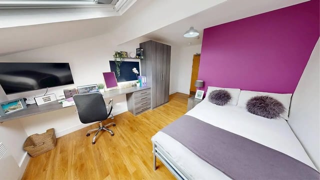 Desk TV wardrobe bed bedroom and study area at Haigh Court in Liverpool Student Accommodation