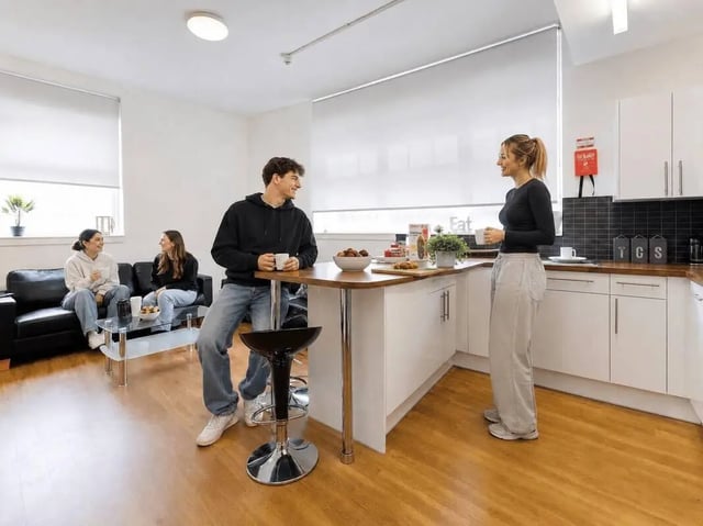 Students in kitchen living area at Haigh Court in Liverpool Student Accommodation
