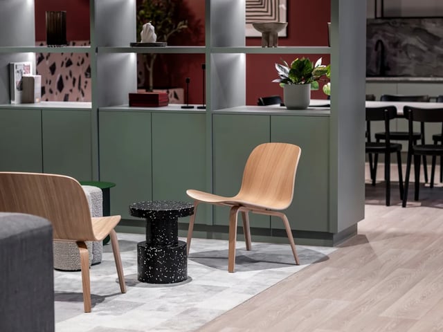 Chairs tables and shelves in lounge area at Dunaskin Mill in Glasgow Student Accommodation
