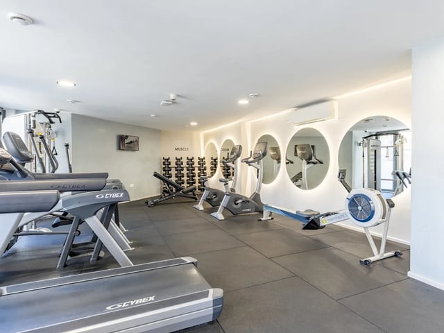 Treadmills rowing machines weights and exercise bikes gym at Dunaskin Mill in Glasgow Student Accommodation