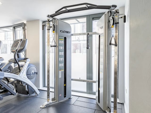 Cybex cable machine and arc trainer gym area at Dunaskin Mill in Glasgow Student Accommodation