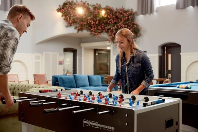 Foosball table and pool table common area at Eden Square in Coventry Student Accommodation
