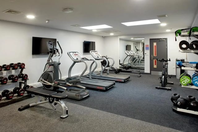 Gym equipment dumbbells treadmills exercise bike gym at Eden Square in Coventry Student Accommodation