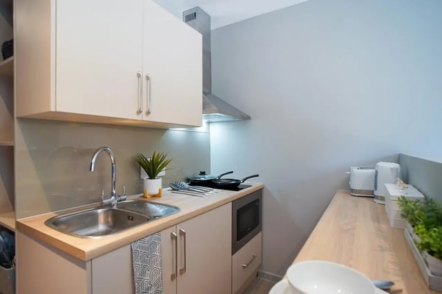 Sink microwave cabinets toaster kettle kitchen at Straits Meadow in Edinburgh Student Accommodation