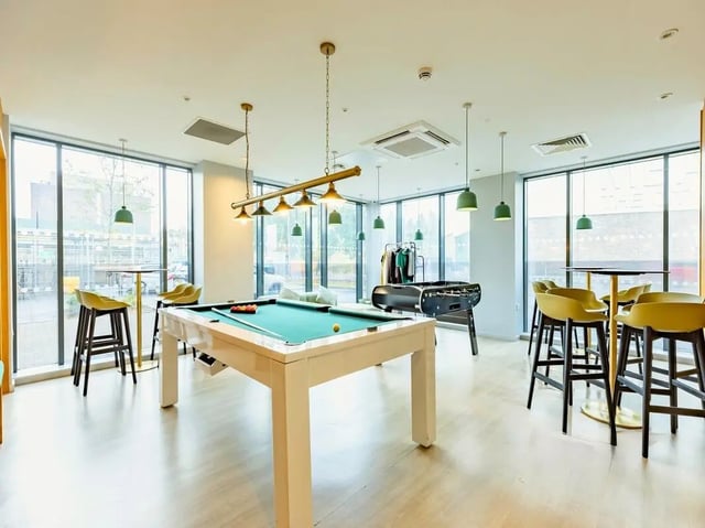 Pool table foosball table bar stools lounge area at Straits Meadow in Edinburgh Student Accommodation