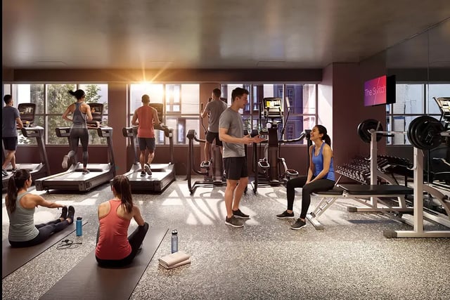 People exercising on treadmills and yoga mats gym at The Switch Berkeley in Melbourne Student Accommodation