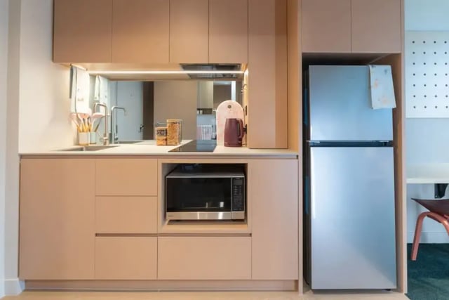 Modern kitchen with sink microwave fridge kitchen at The Switch Berkeley in Melbourne Student Accommodation