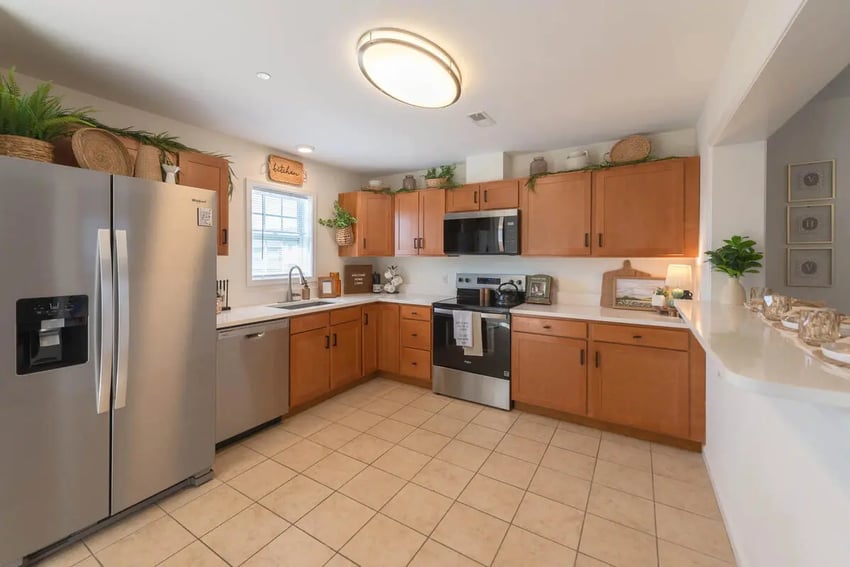 Stainless steel fridge stove cabinets microwave kitchen at The Villas at Happy Valley in State College Student Accommodation