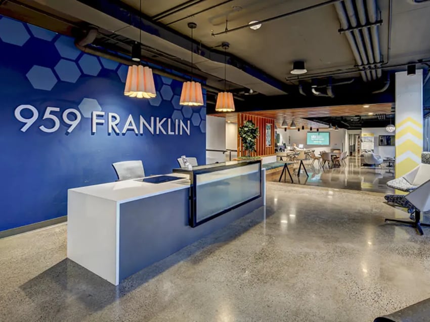 959 Franklin reception desk with chairs lobby area at 959 Franklin in Eugene Student Accommodation