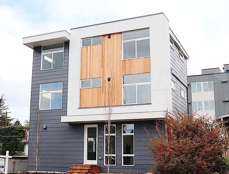 Modern townhouse with wood and gray siding exterior at Husky Urban Living in Seattle Student Accommodation